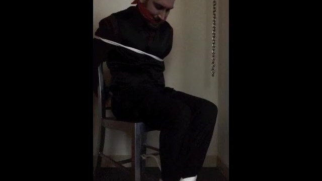 Chairtied in a Suit