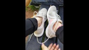 Foot Goddess Removes Stinky Sneakers and Puts Smelly Feet up on his Lap