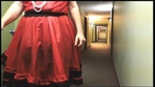 Sissy Ray in Hotel Corridor in Red Sissy Uniform