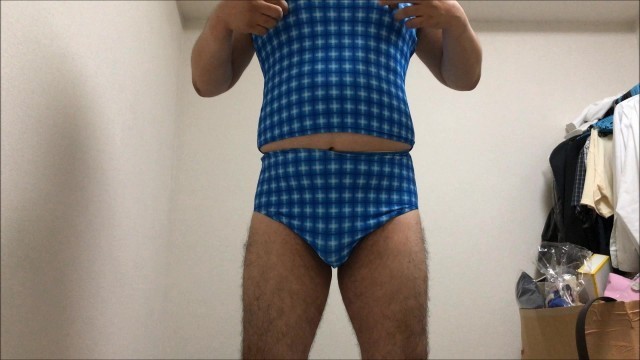 Masturbating in his swimwear