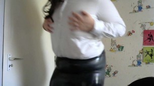 Tranny with latex skirt blowing dildo