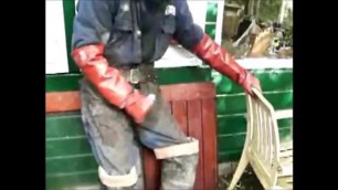 great guy in waders, rubber boots, mud and overall